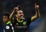 LEICESTER, ENGLAND - JANUARY 14:  Pedro (R) of Chelsea celebrates after scoring his team's third goal during the Premier League match between Leicester City and Chelsea at The King Power Stadium on January 14, 2017 in Leicester, England.  (Photo by Laurence Griffiths/Getty Images)